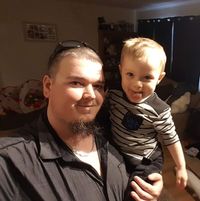 Reviewer Anthony Struthers' photo: man holding a young boy